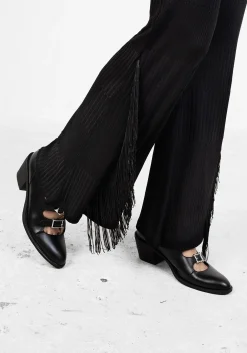 Coyote Fringed Jersey Flares